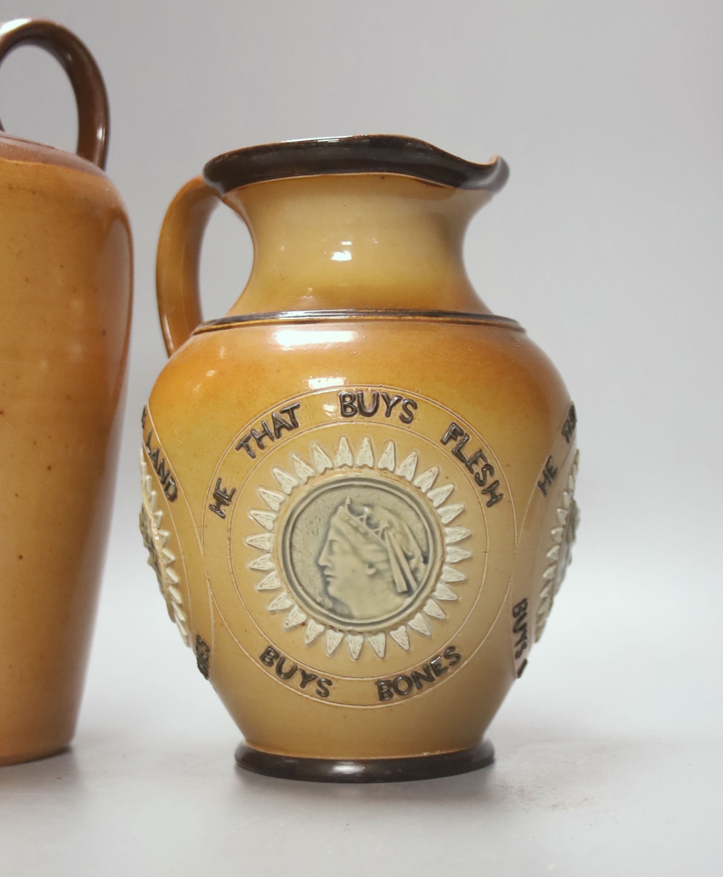 A Doulton Lambeth Angus Mackay's N.Y.O. stoneware flagon, 26cm, and a similar motto jug, 19cm